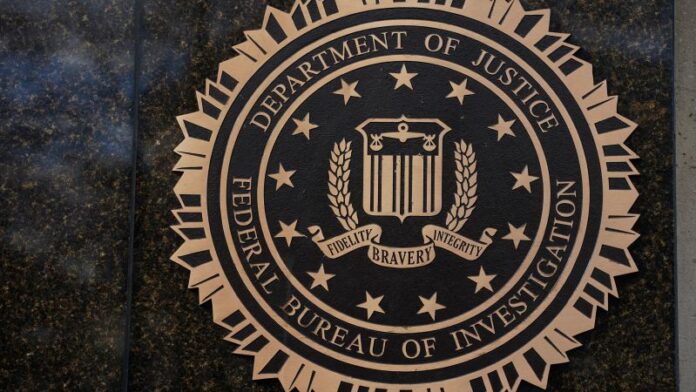 Featured image related to FBI arrests cybersecurity executive in major hack on agents’ data | CNN Politics